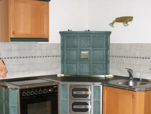 Küchenherd mit Elektroherd in modern mit Holzschuber und Spüle